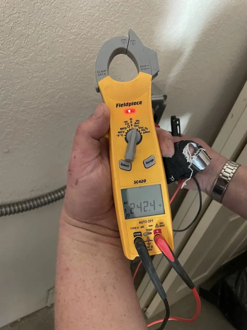 Voltage testing with clamp meter during Generator Installation in Belle Isle